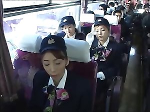 stewardesses at the office finish up on the bus